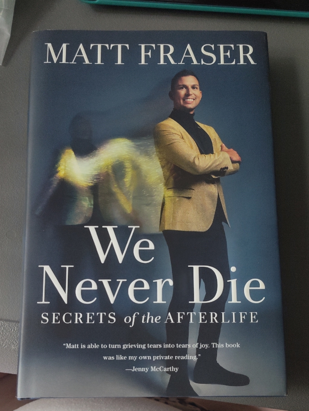 Matt Fraser "We Never Die" Hardcover Book - Blue with Gold Jacket